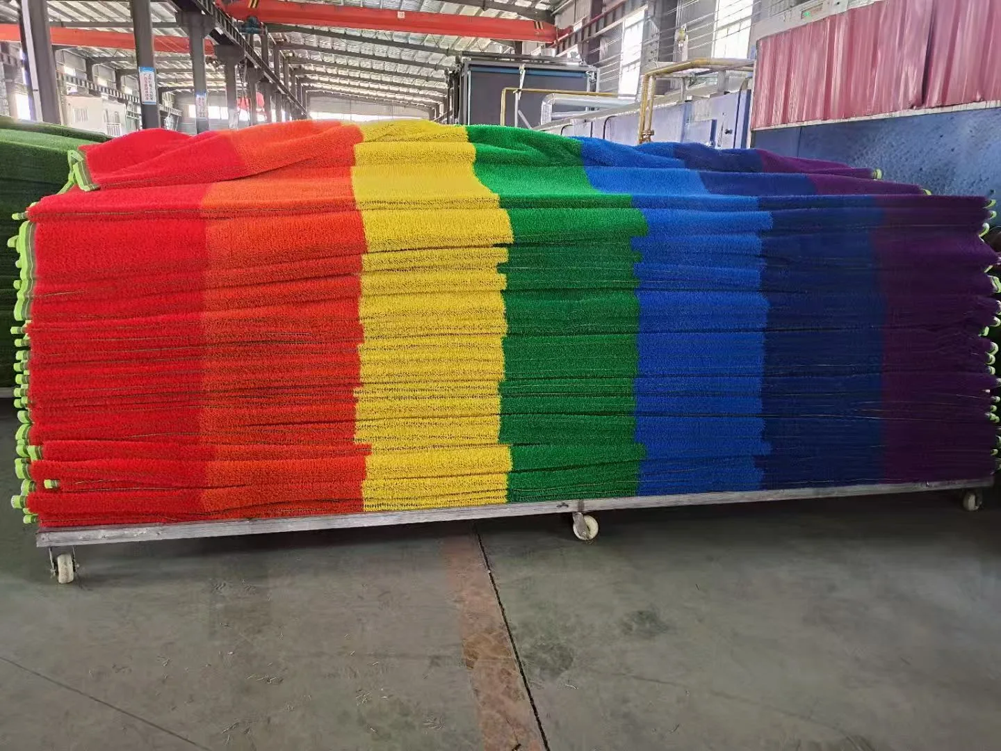 Artificial grass rolls prepared in warehouse stock