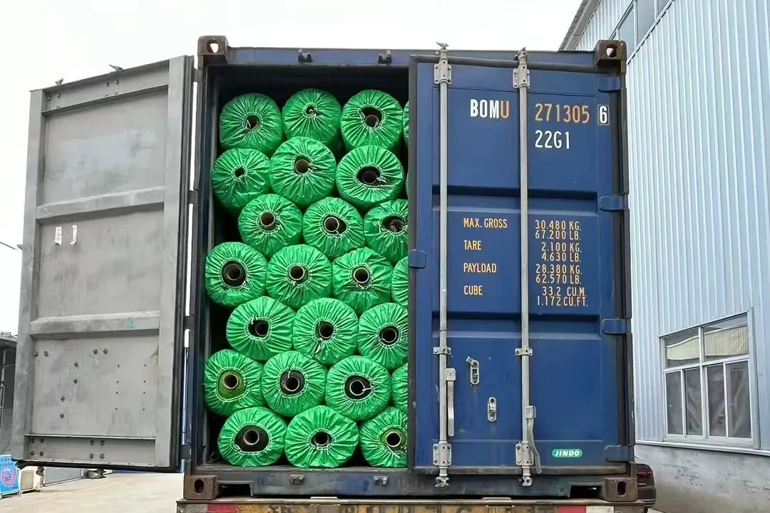 Artificial grass rolls loaded into export container for B2B shipment
