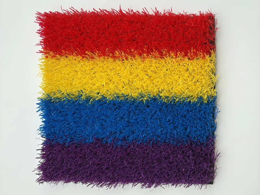 Colorful artificial grass sample for playground and kindergarten areas
