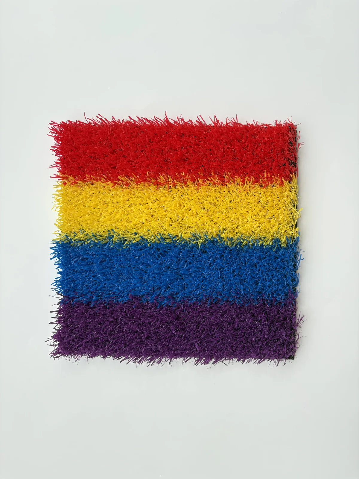Colorful playground artificial grass front view sample