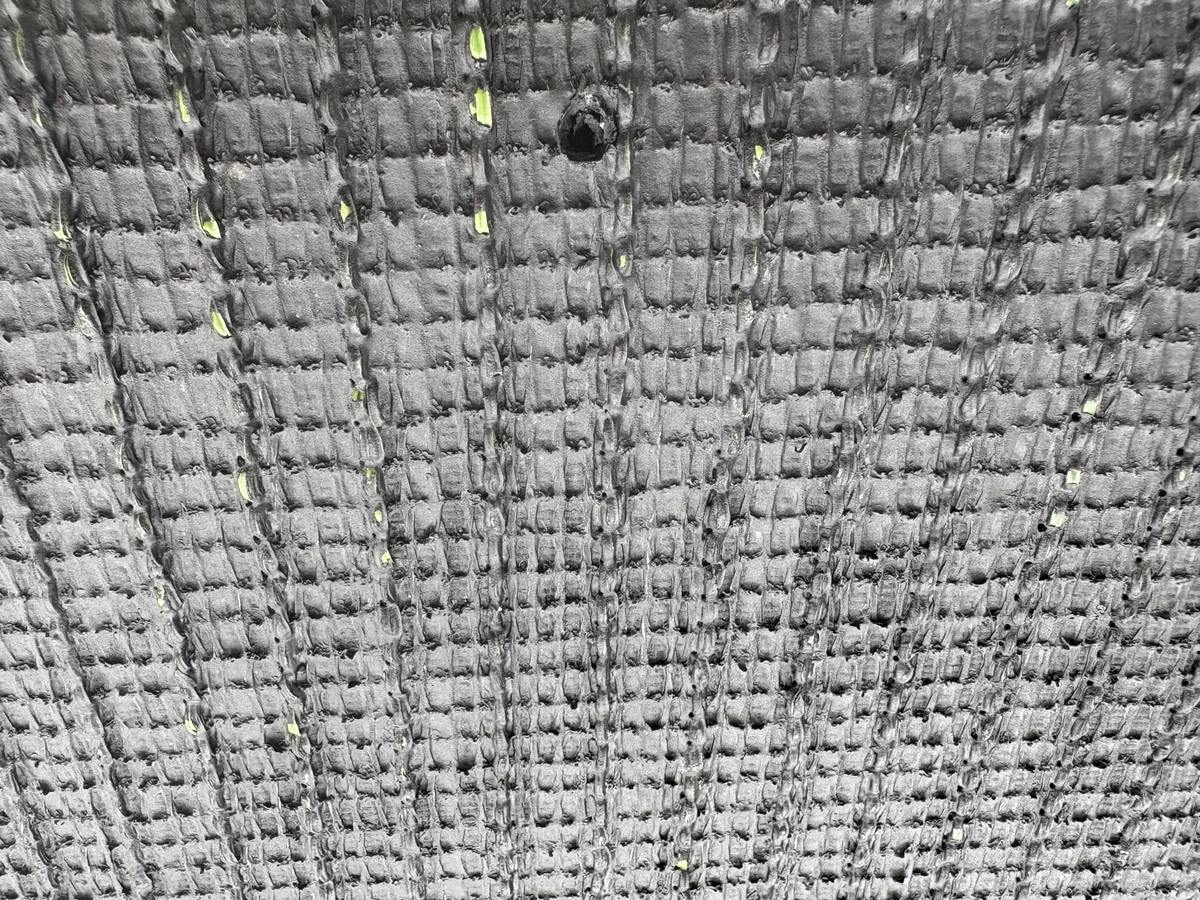 Football artificial turf backing texture detail