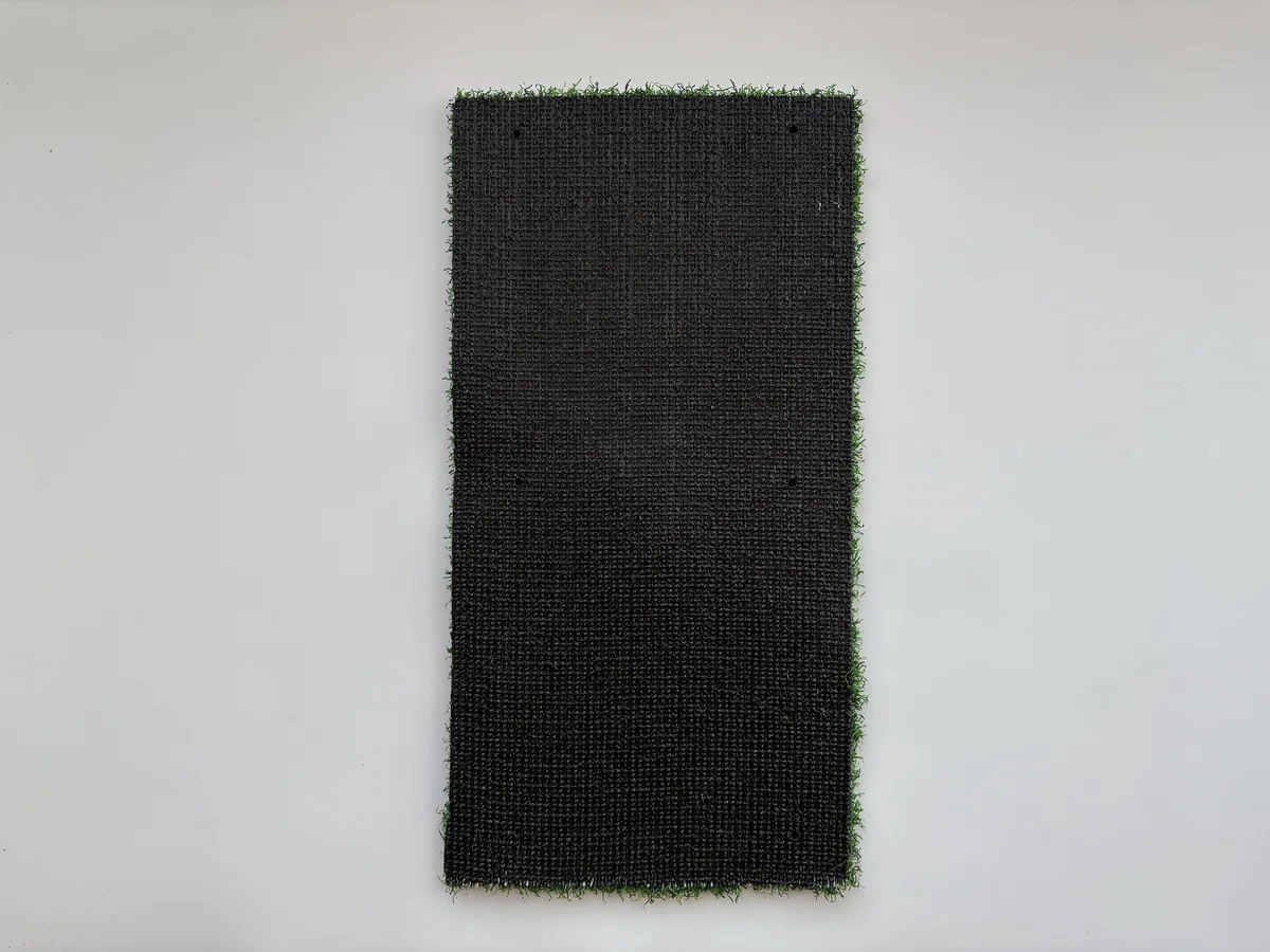 Putting green artificial grass backing full view