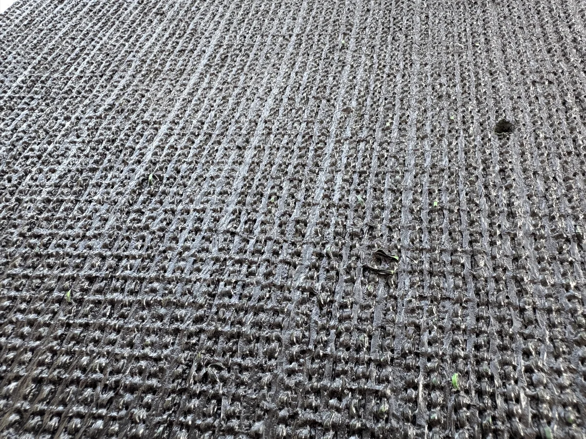Putting green artificial grass backing texture and drainage detail