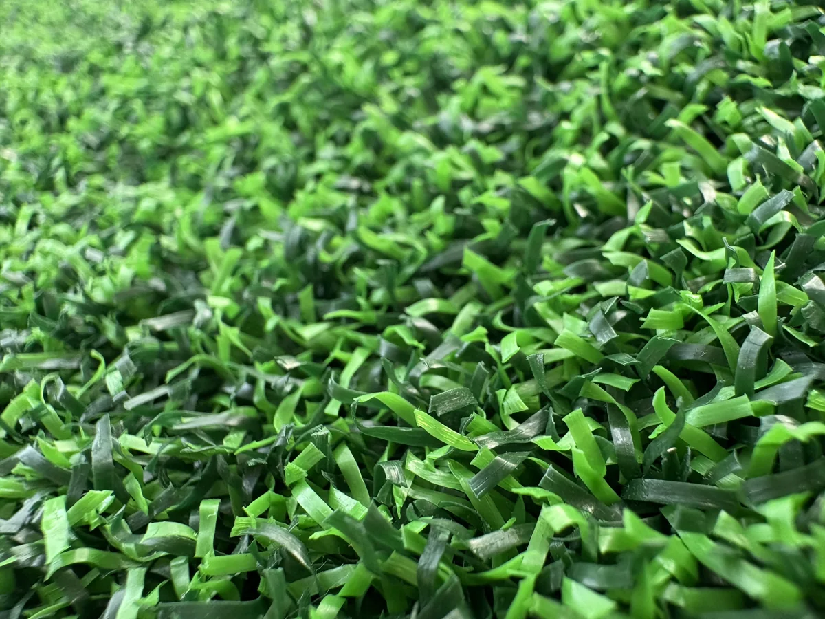 Putting green artificial grass yarn close-up for product review
