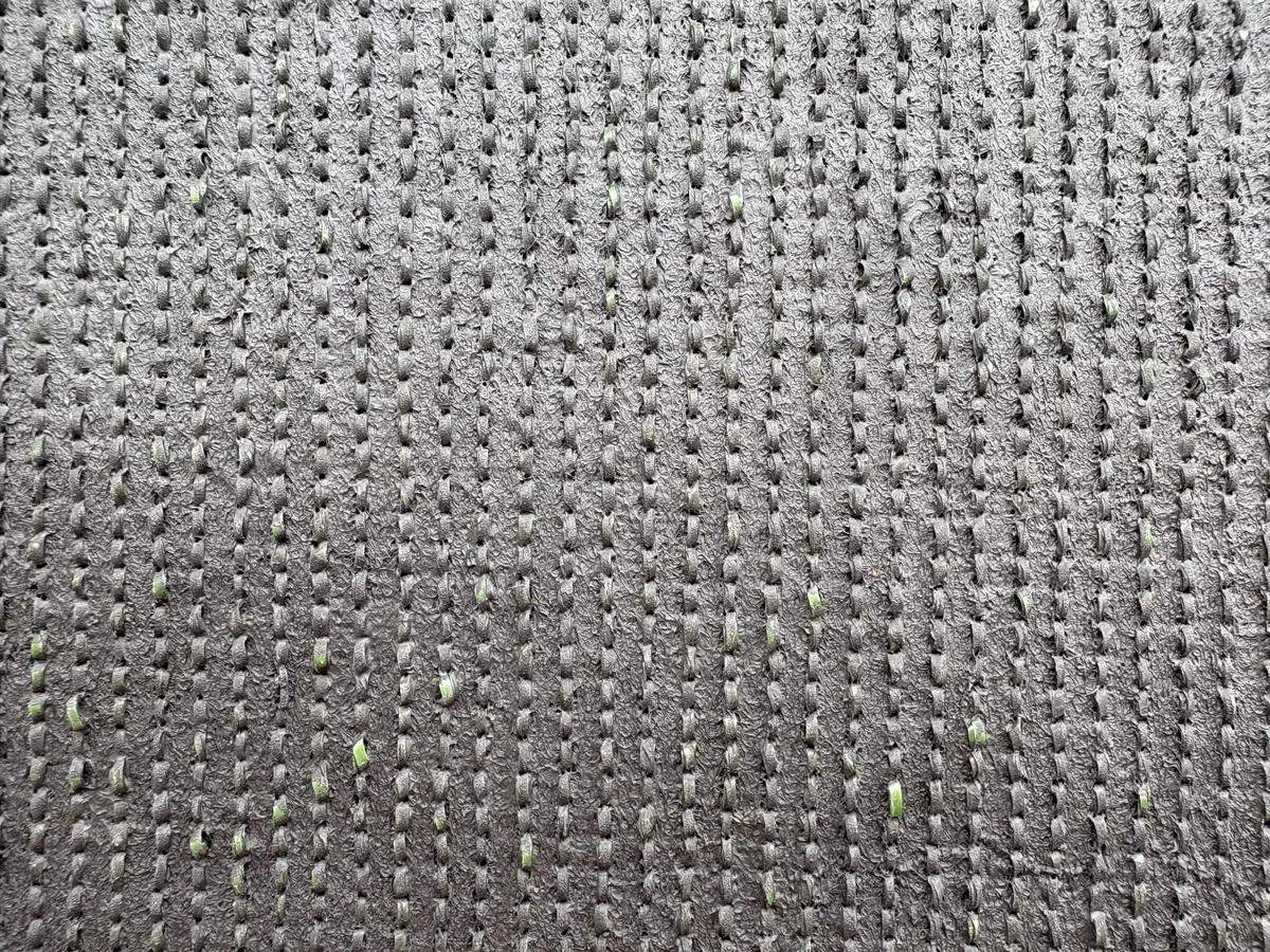 Fence and wall artificial grass backing texture detail